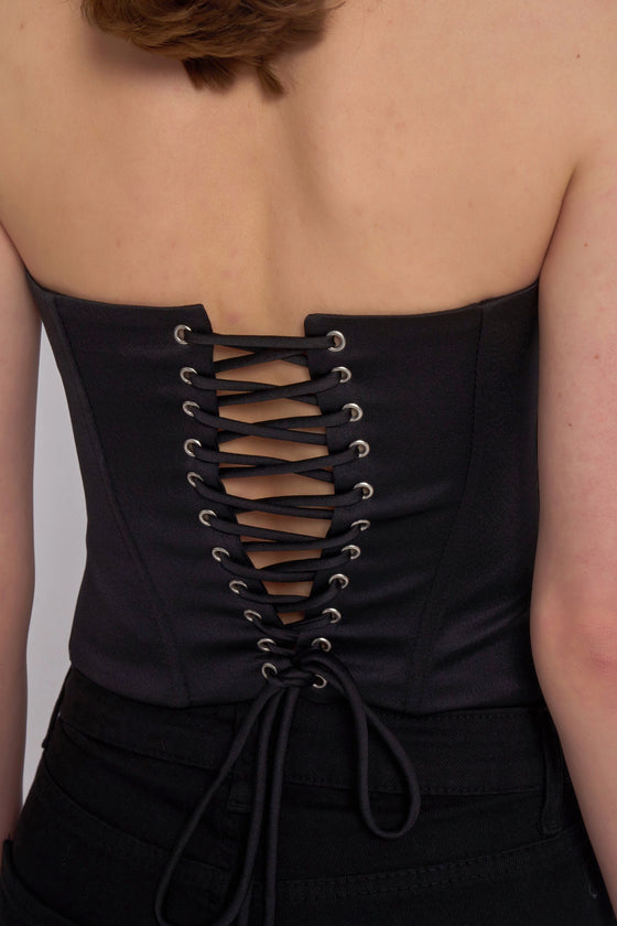 Corset satiné à manches longues