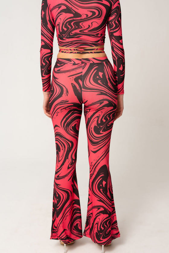 Wijde broek met fuchsia patronen